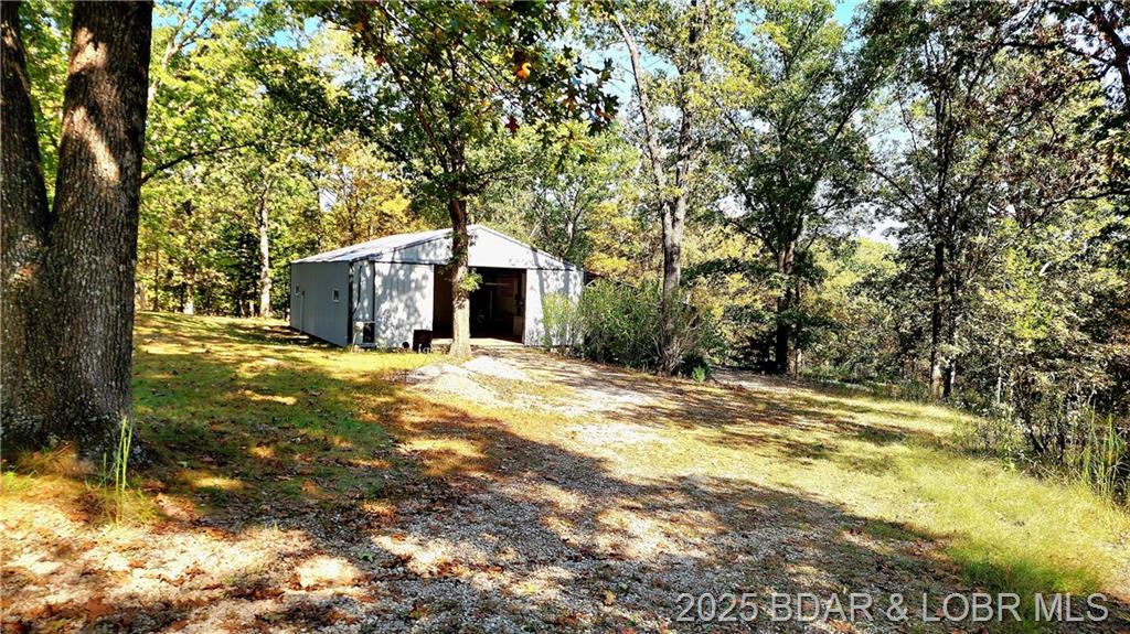 Photo 40 - Residential for sale – 20316  Wildwood Circle  Versailles, MO