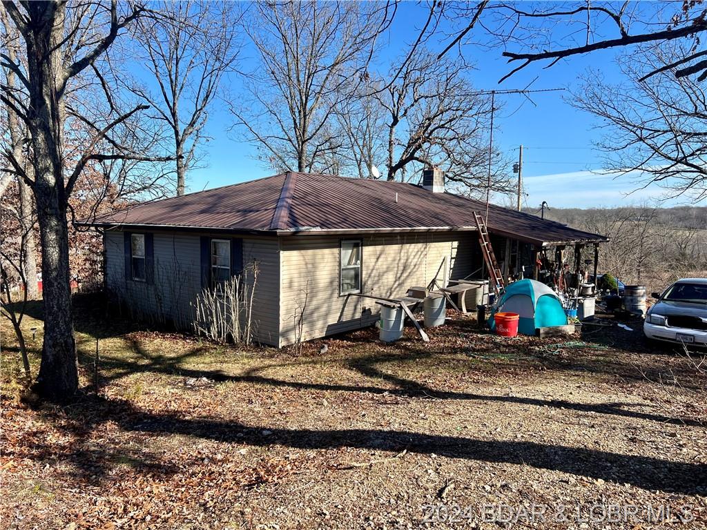 Photo 3 - Residential for sale – 13338  US Hwy 54   Macks Creek, MO